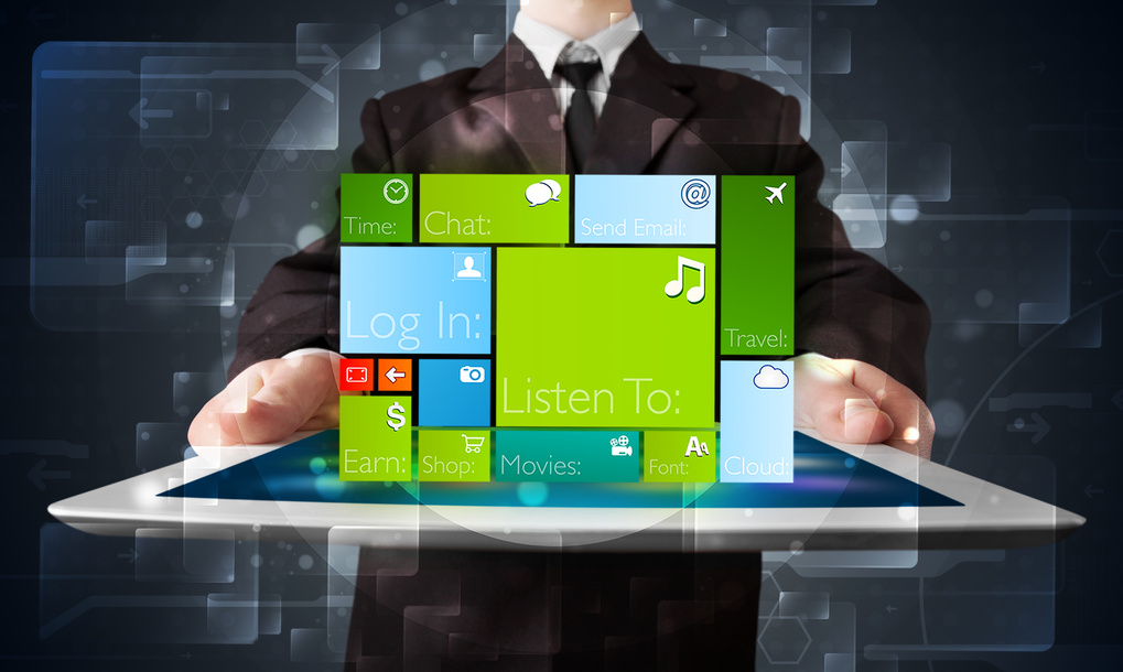 Businessman holding a tablet with modern software operational system